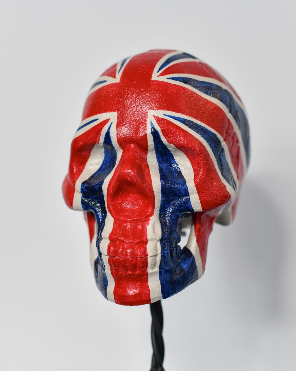 Close up of intricate face detail on handpainted skull decoration