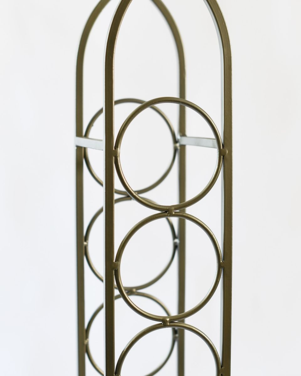 Close up of bottle slots on wine rack