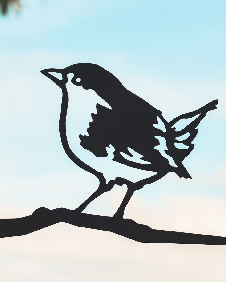 Close up of intricate cut out detail on Wren Tree Spike 