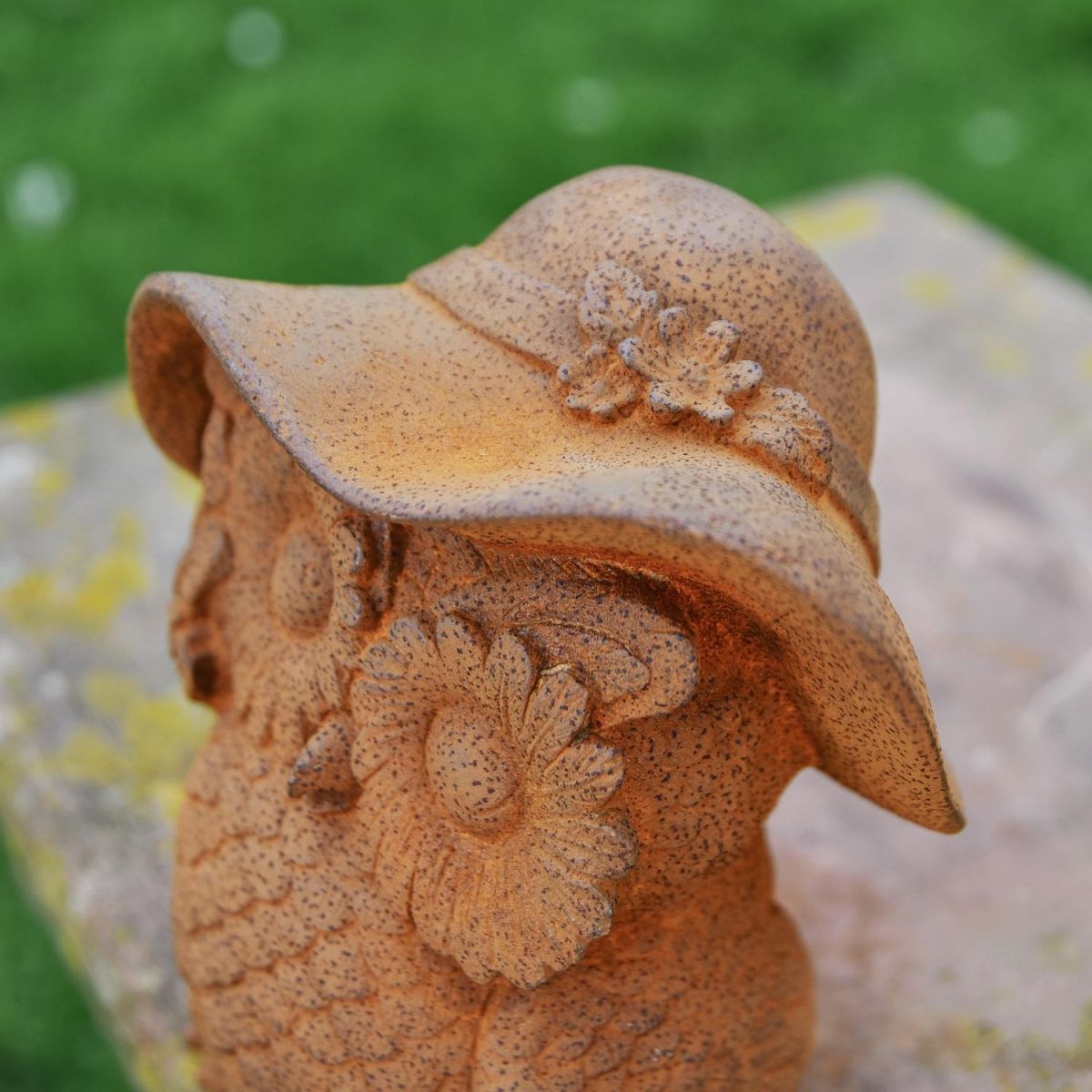Close up of Floral Embellishments on Owl Sculpture  Close up of Floral Embellishments on Owl Sculpture