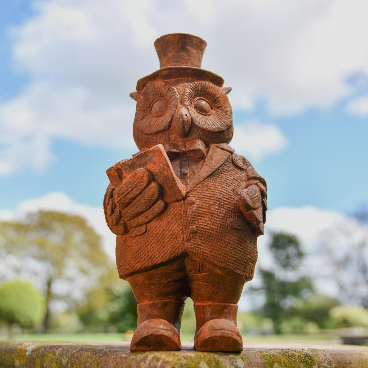 Rustic Cast Iron Nobleman Owl Sculpture in Garden Rustic Cast Iron Nobleman Owl Sculpture in Garden
