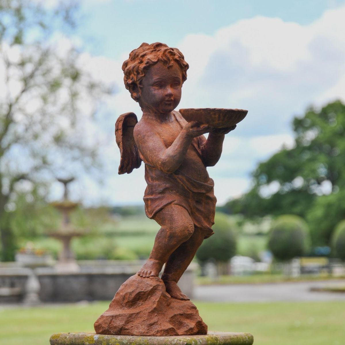 Rustic Cast Iron Winged Cherub with Bird Bath Sculpture Rustic Cast Iron Winged Cherub with Bird Bath Sculpture