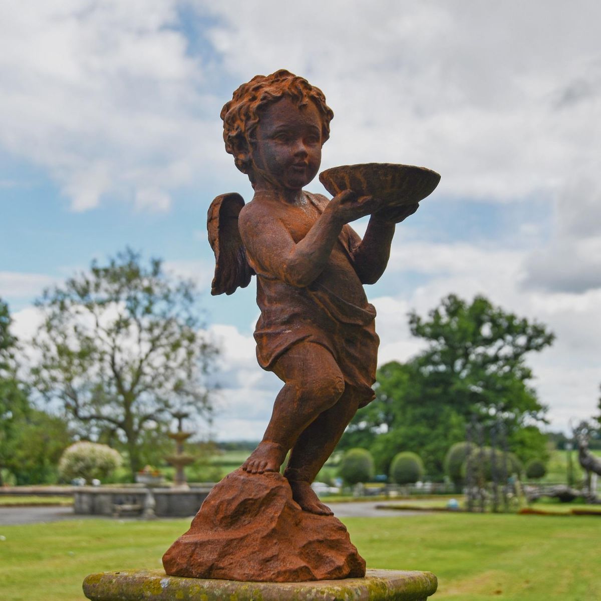 Rustic Cast Iron Winged Cherub with Bird Bath Sculpture Rustic Cast Iron Winged Cherub with Bird Bath Sculpture