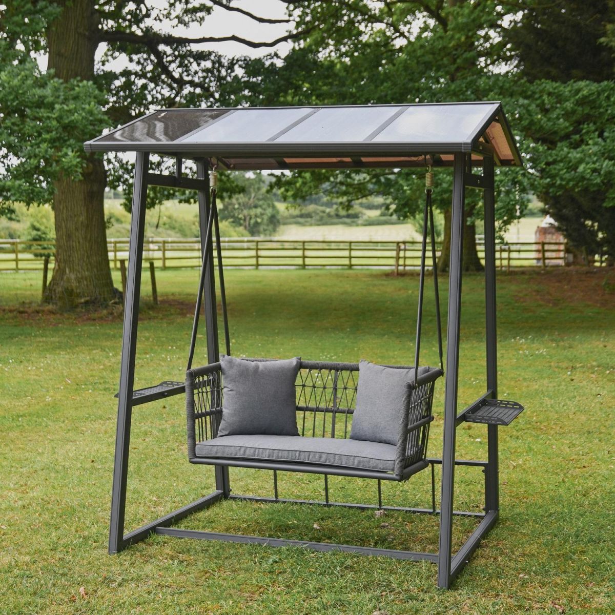 Grey "Cliveden" Rattan Garden Swing Chair in Garden  Grey "Cliveden" Rattan Garden Swing Chair in Garden