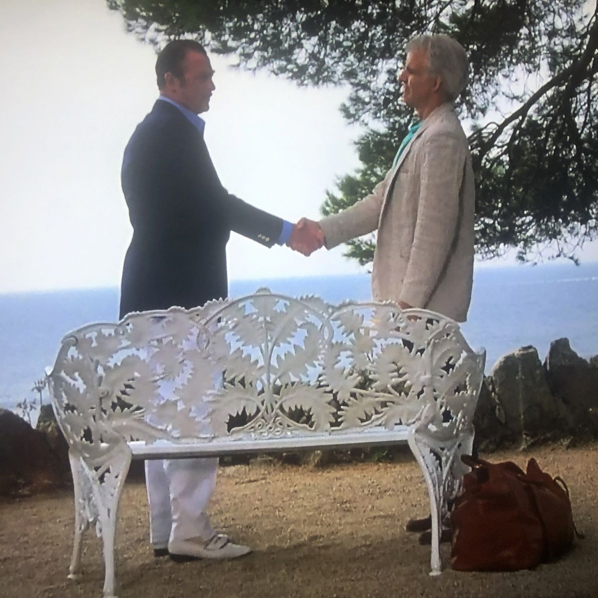 Steve Martin and Micheal Caine in the Movie Dirty Rotten Scoundrels Next to a Cream Coolbrookdale Bench
