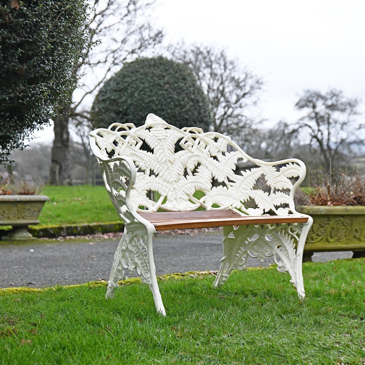 "Coalbrookdale" Two Seater Garden Bench in Use Outdoors