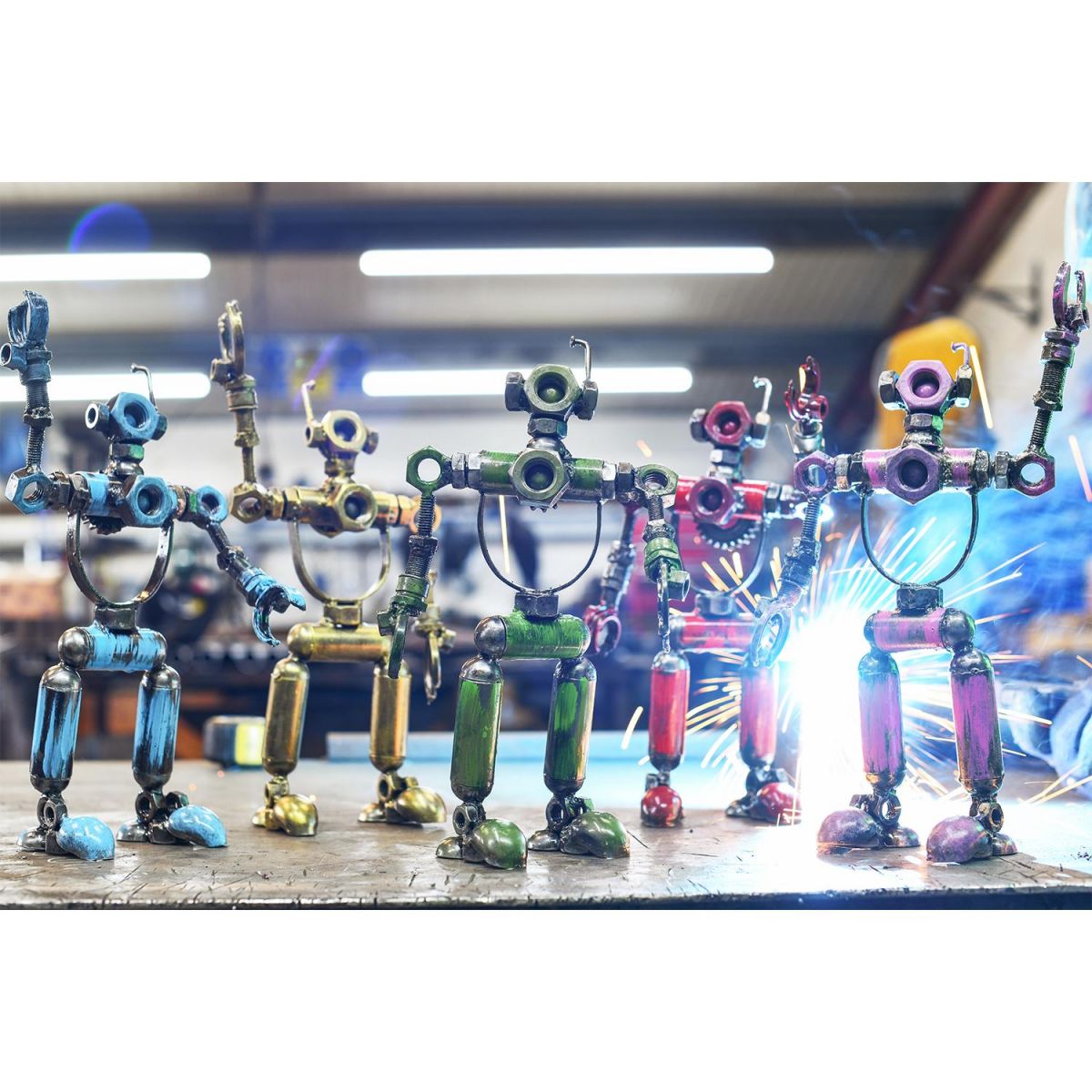 Colourful Upcycled Metal Men Group Sculpture With Sparks 