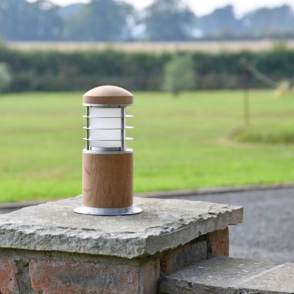 Compact Wooden Bollard Light in Situ on a Pillar