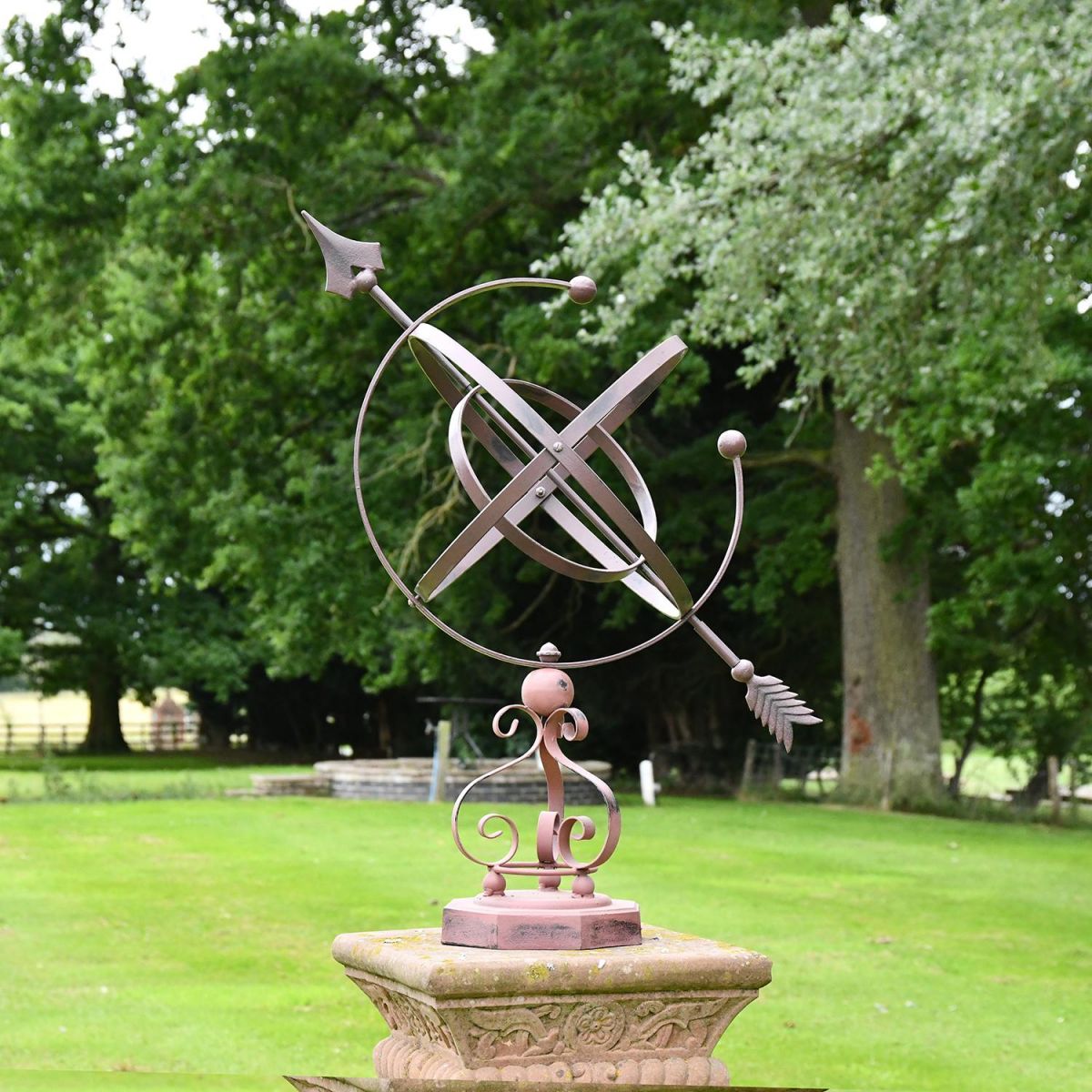Wrought Iron Armillary in Situ in the Garden on a Stone Plinth