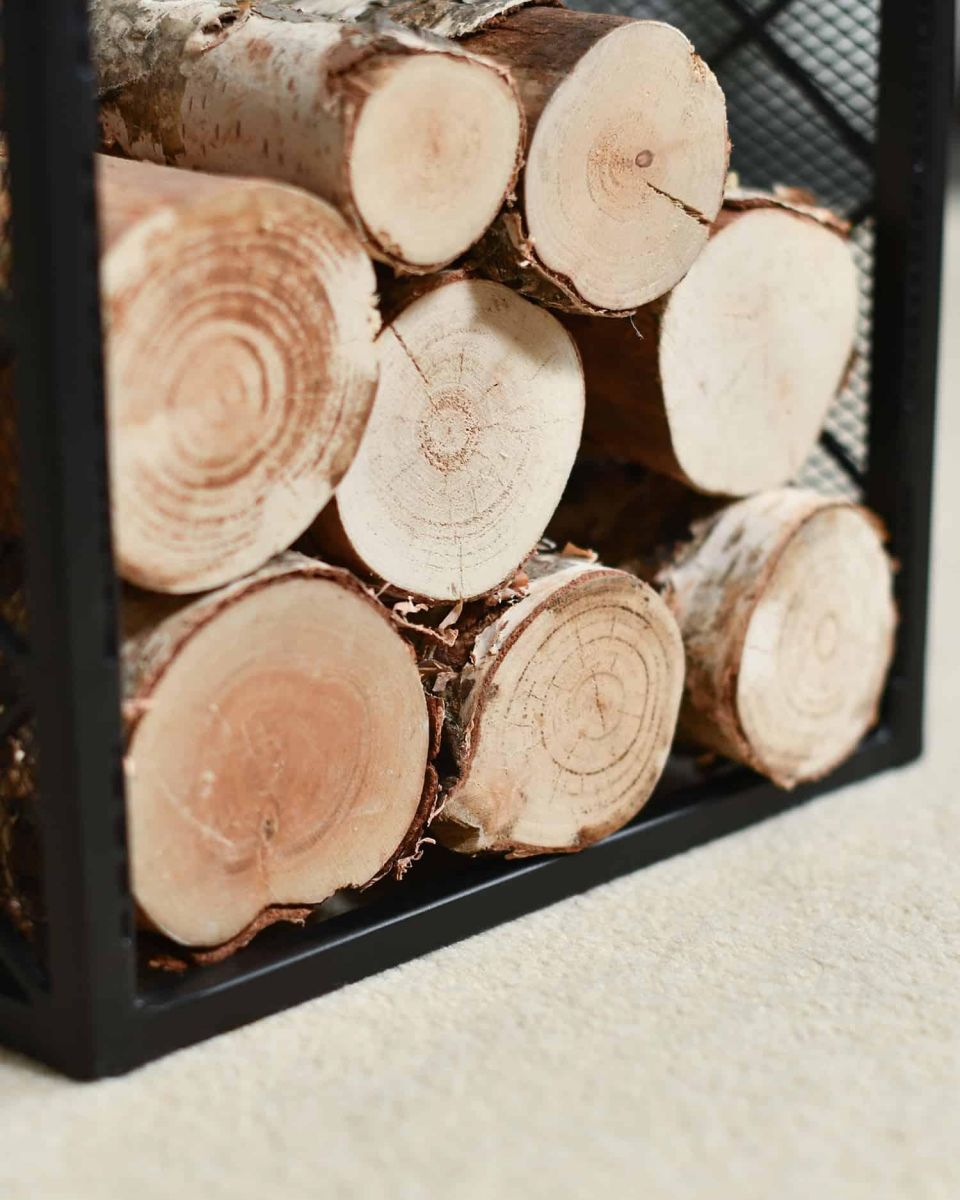 Close-Up of Contemporary "Diamond" Design Log Holder in Use