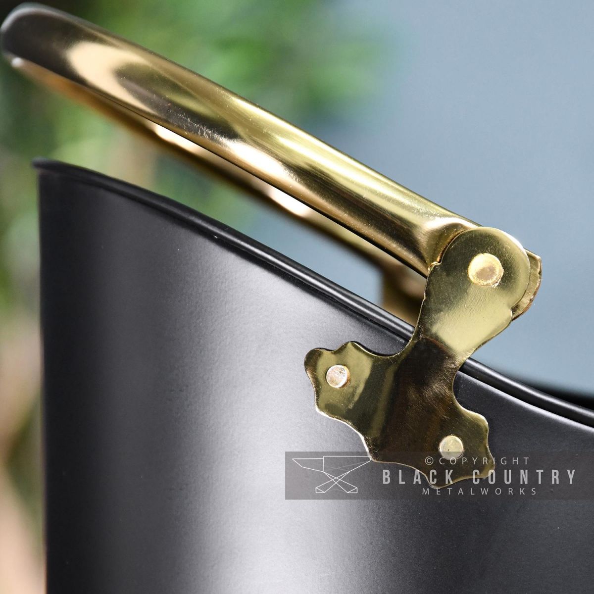 Close-up of the Brass Handles on the Coal Hod Close-up of the Brass Handles on the Coal Hod