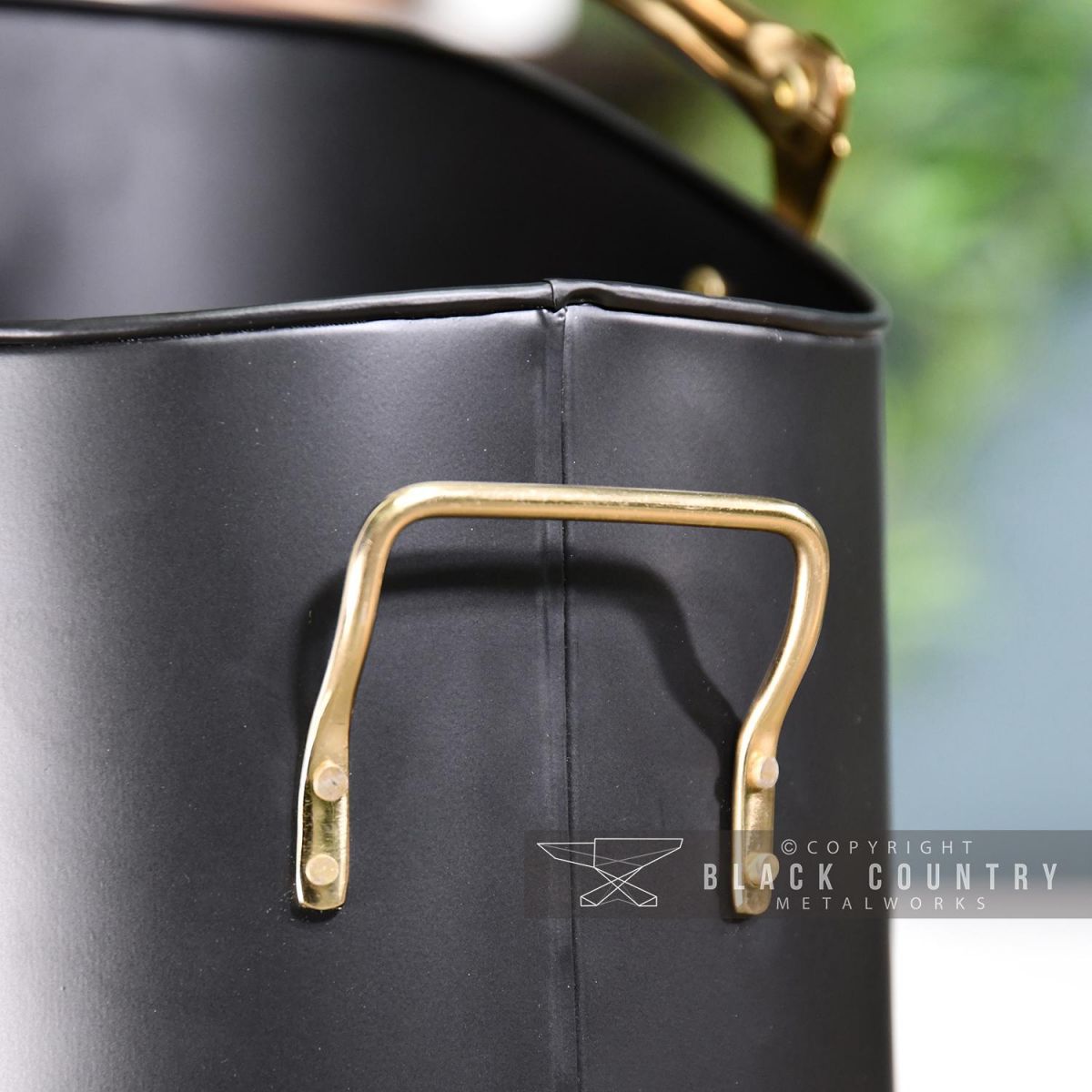 Brass Carry Handle on the Back of the Coal Hod Brass Carry Handle on the Back of the Coal Hod