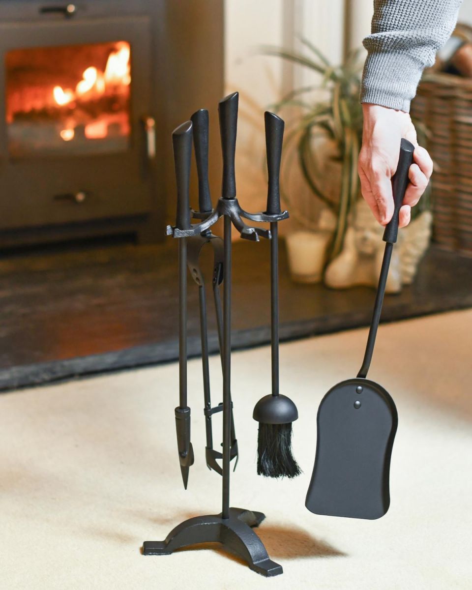 Scale Shot of Contemporary Black "Tripod" Four Piece Companion Set