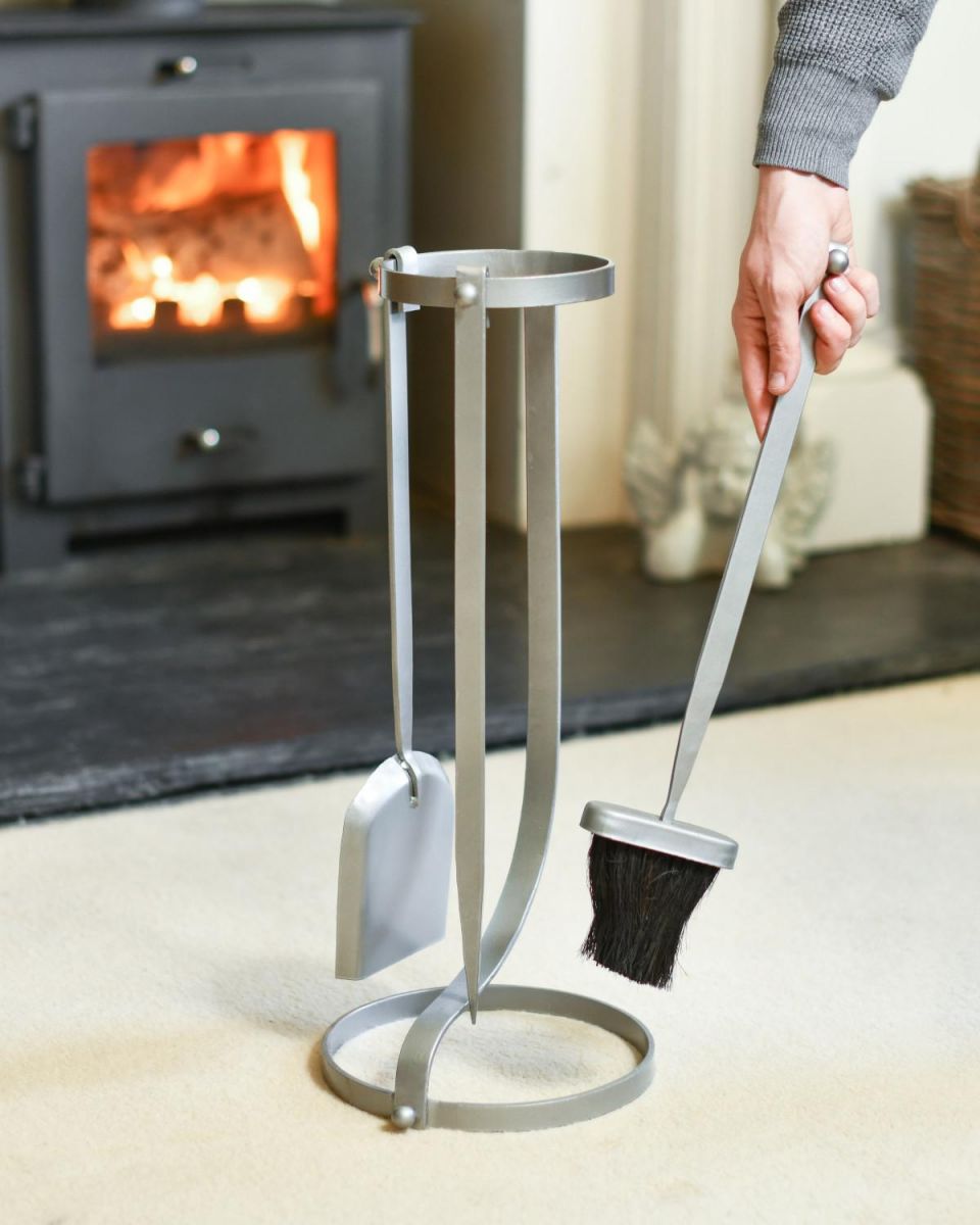 Scale Shot of Contemporary Curved Pewter Three Piece Companion Set