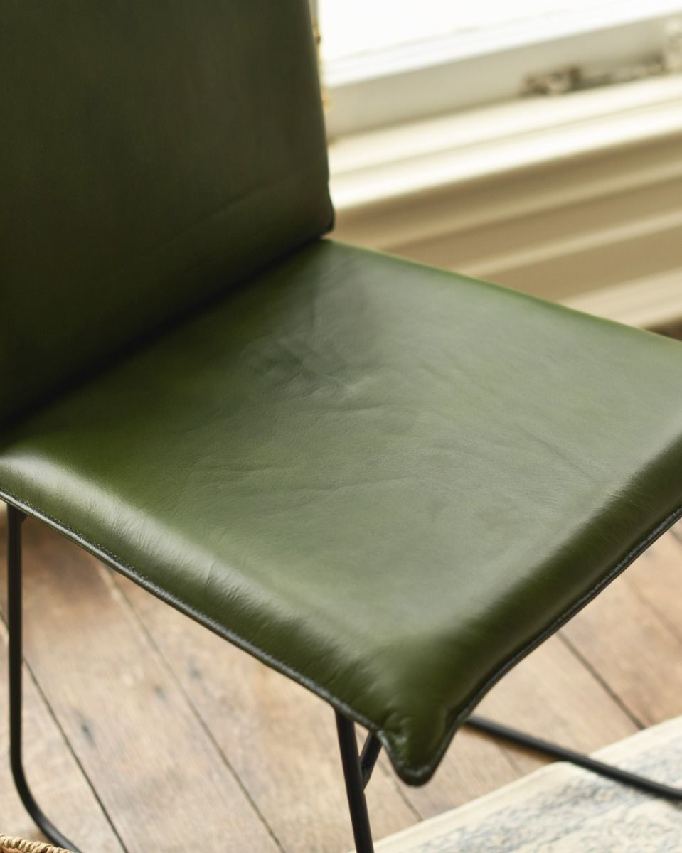 Seat Close Up of Contemporary Olive Green Leather and Black Steel Chair