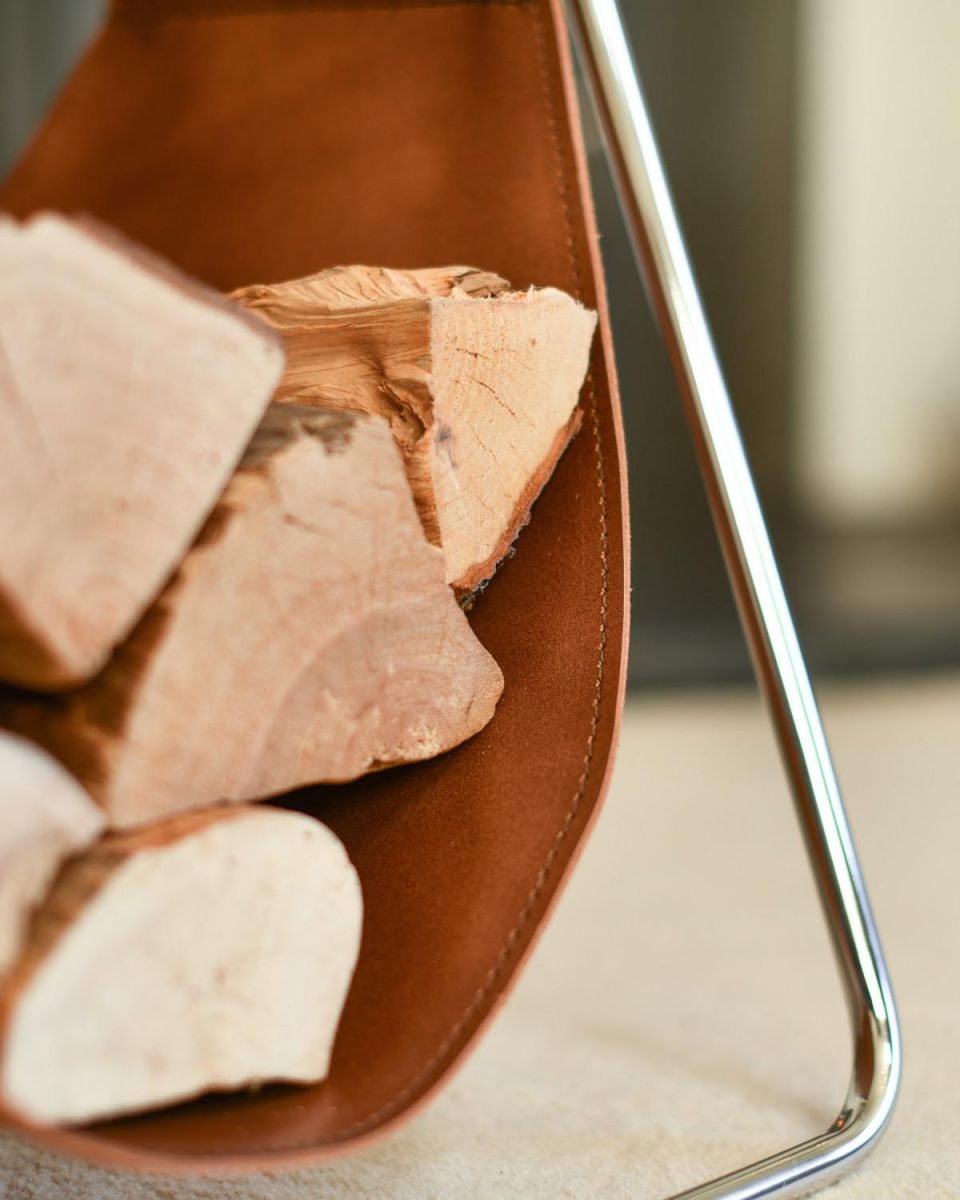 Close-Up of Contemporary Steel "Cradle" Design Log Holder