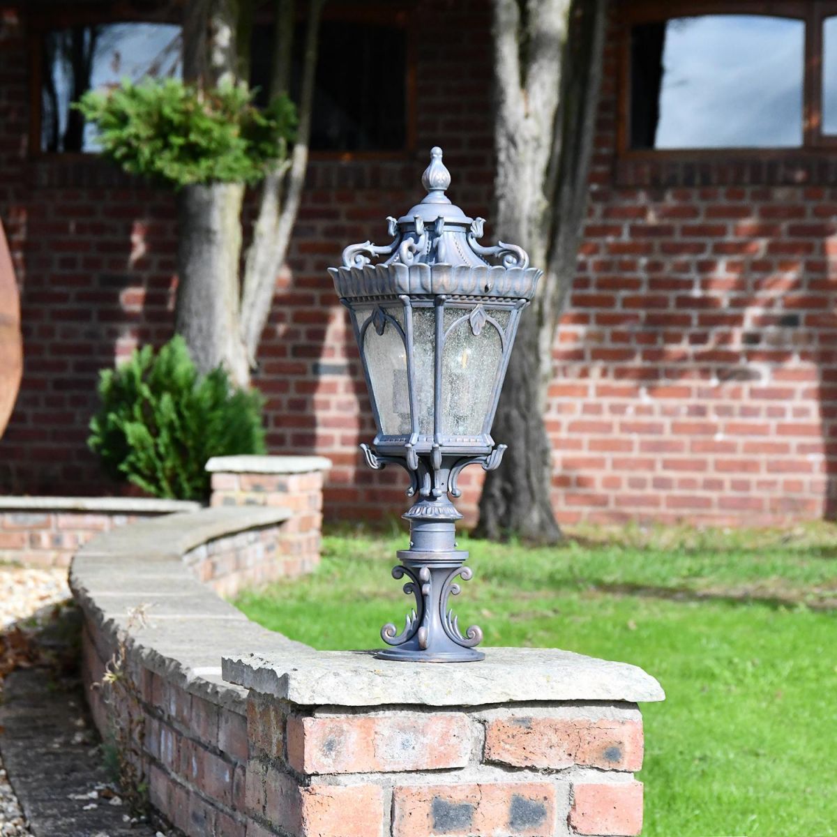 "Cotswold" Grand Ornate Gold Pillar Light in Situ on a Brick Wall