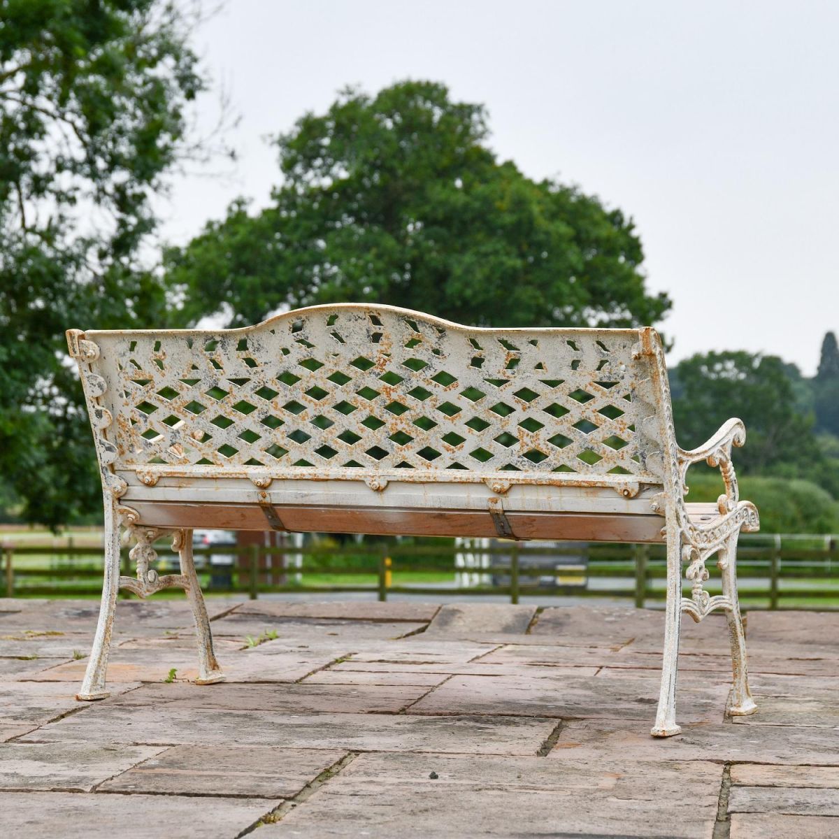 Rear view of Antique Cream Cast Iron "Rose Lattice" Garden Bench
