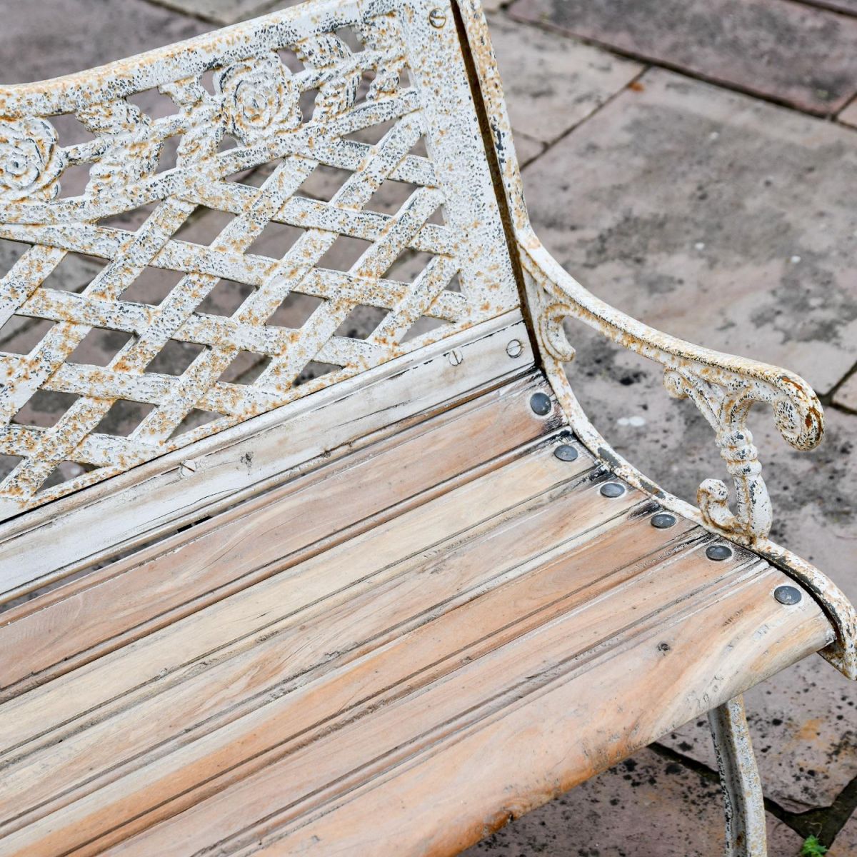 Close up of Antique Cream finish on "Rose Lattice" Bench with Wood Slats