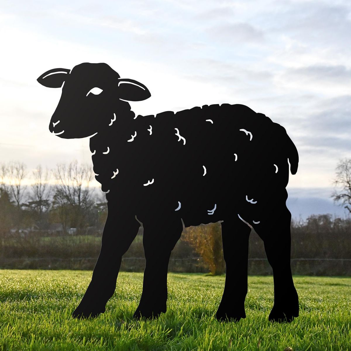 Black Iron Curly Lamb Silhouette in Situ in the Garden