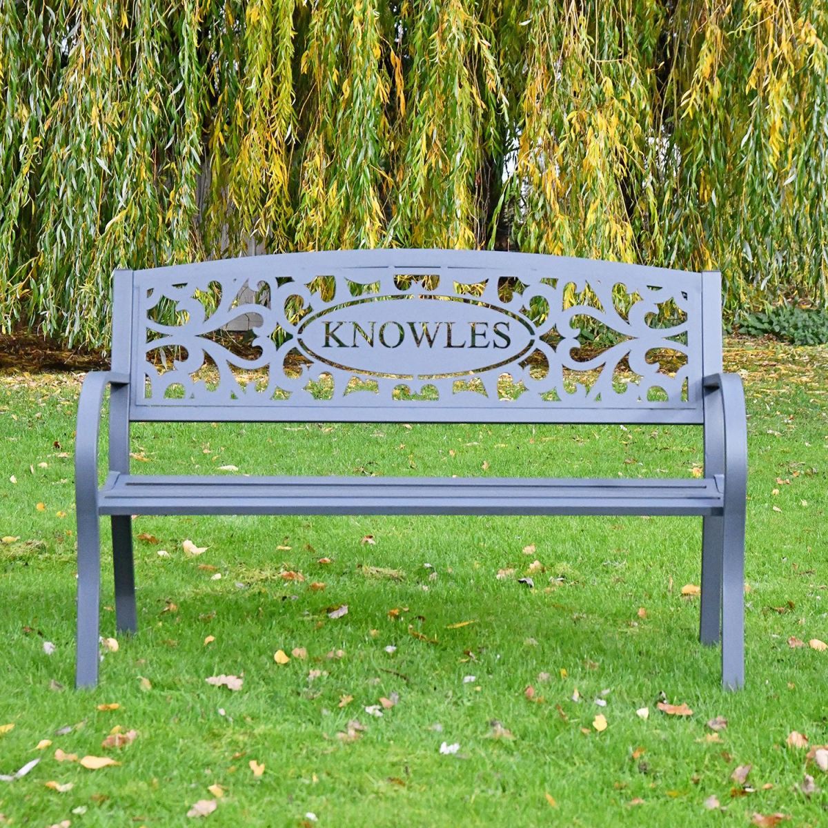 Family Name Iron Bench in Situ in the Garden