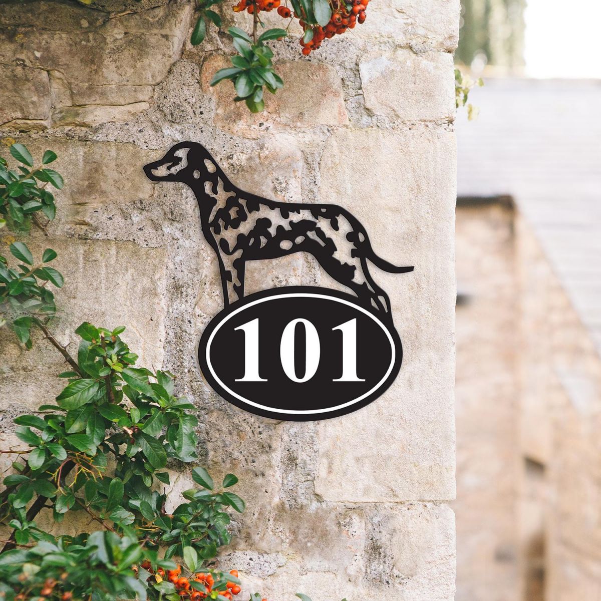 Bespoke Dalmatian Iron House Number Sign on a Garden Wall