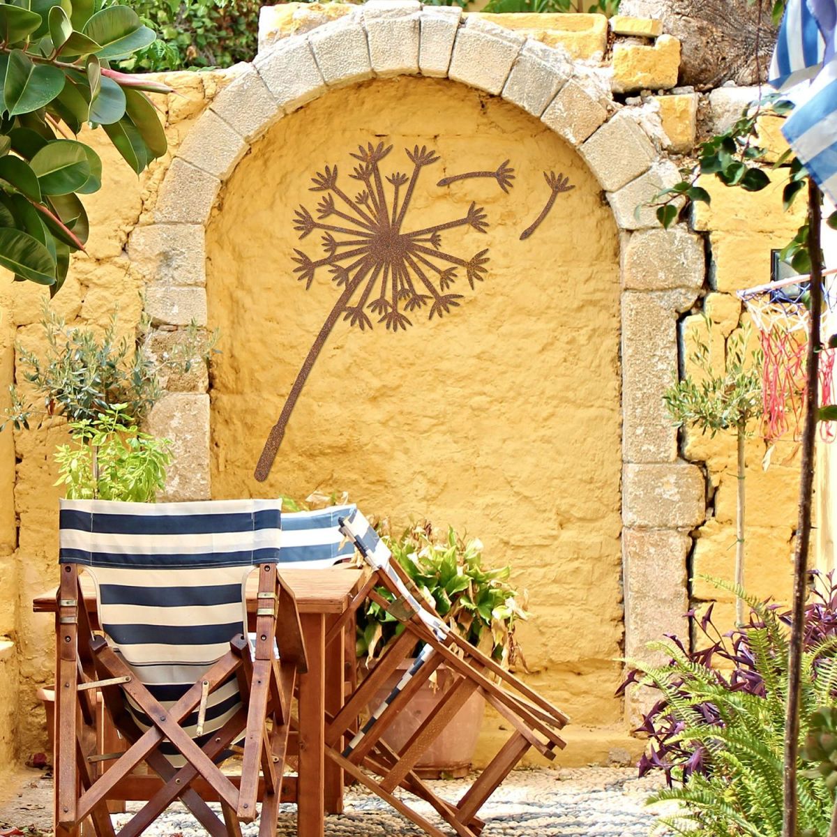 Dandelion Wall Art on a Yellow Wall in the Garden Dandelion Wall Art on a Yellow Wall in the Garden