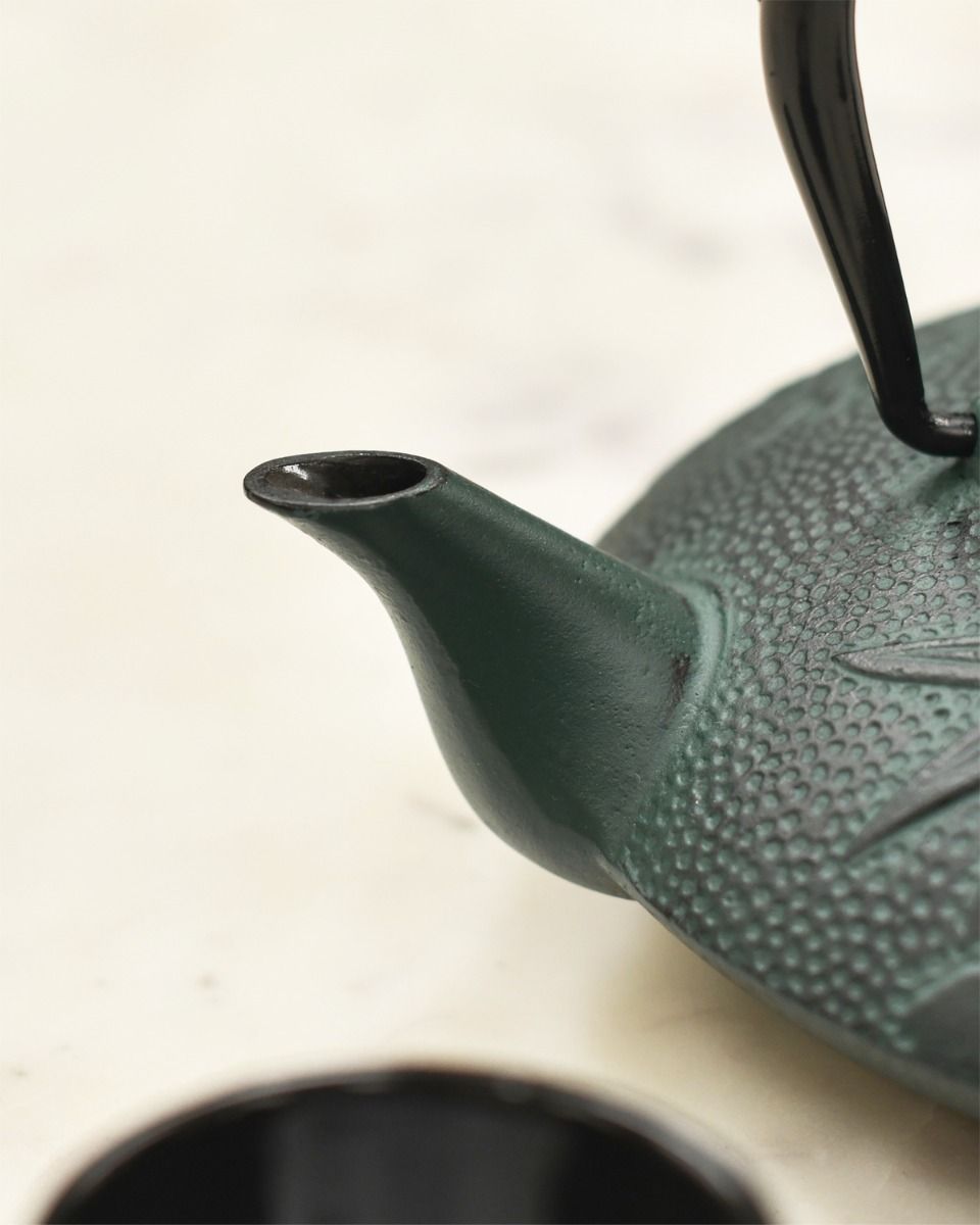Close up of Dark Green Teapots Spout Close up of Dark Green Teapots Spout