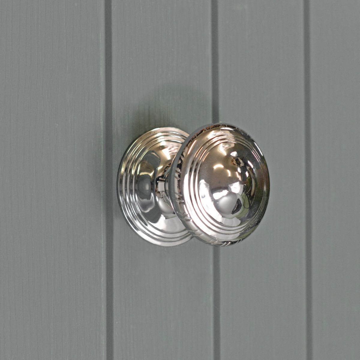 Circular Bright Chrome Centre Door Knob in Situ
