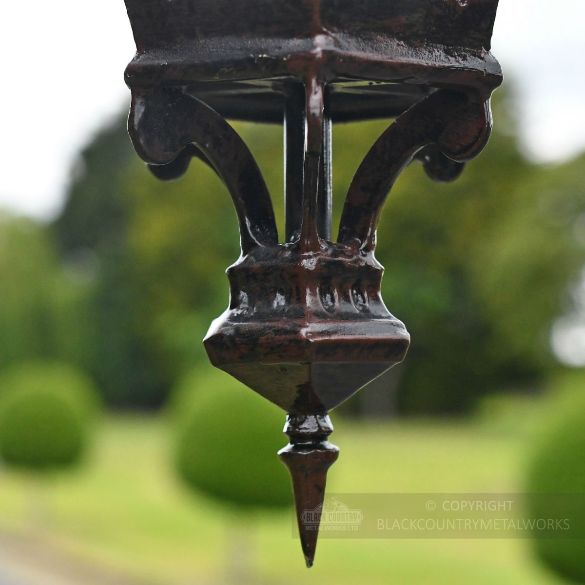 Decorative Finial On Ornate Luminaire Decorative Finial On Ornate Luminaire