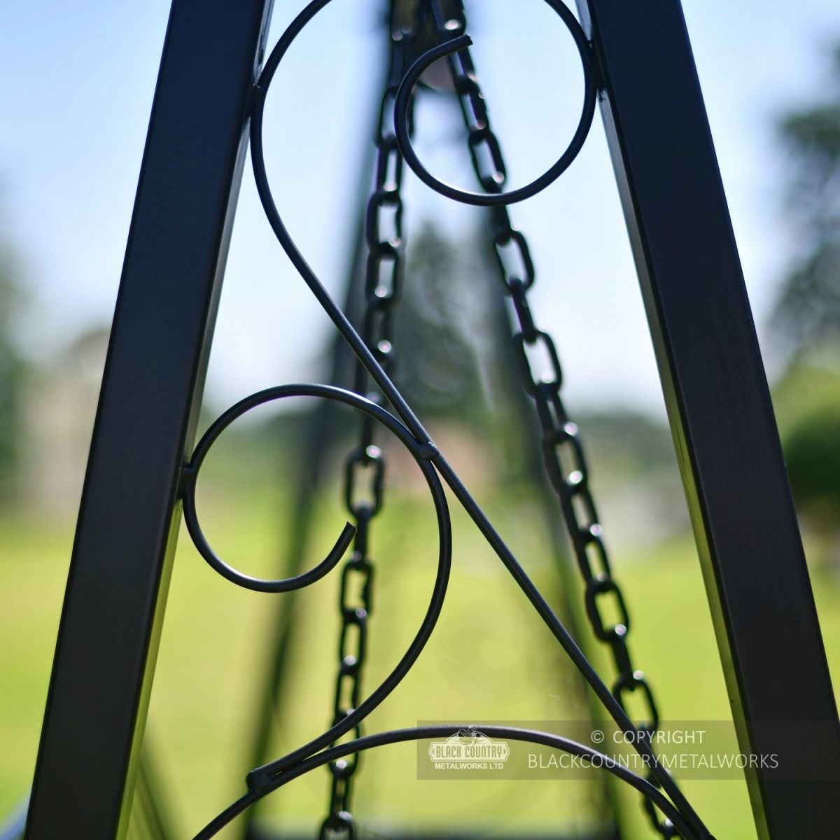 Decorative scrolls on garden swing seat