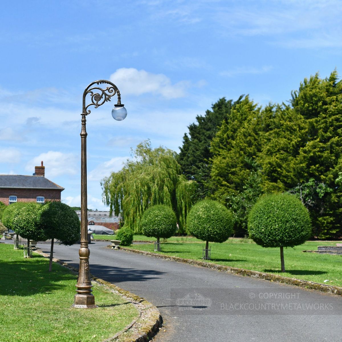 Deluxe Antique Gold Ornate Cast Iron Globe Lamp Post In Garden Setting