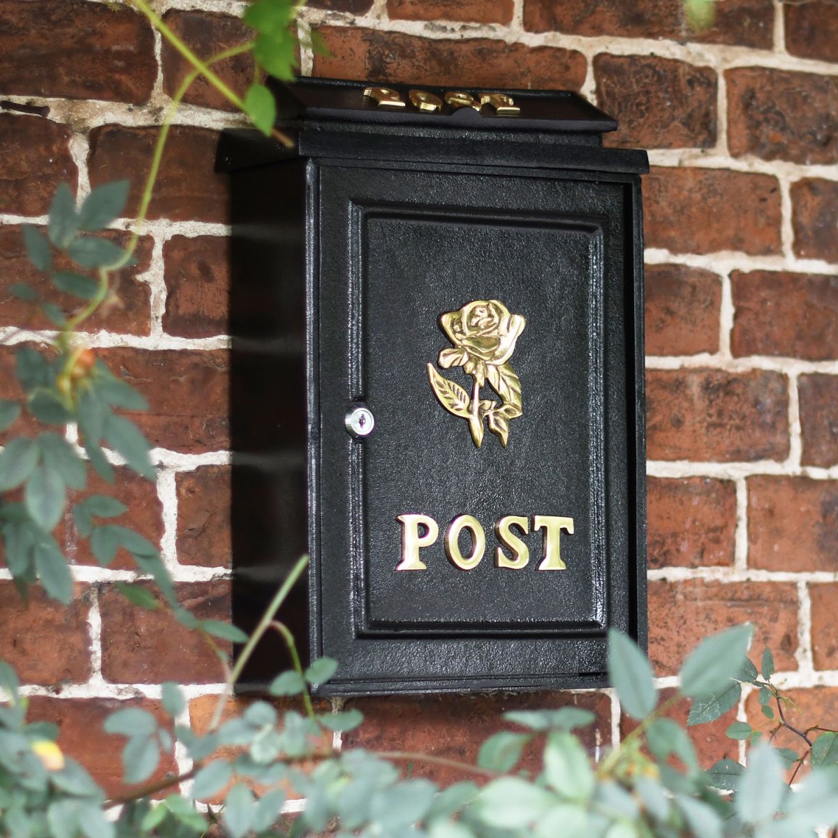 Deluxe Polished Brass “Tudor Rose” Wall Mounted Post Box in USe Outdoors