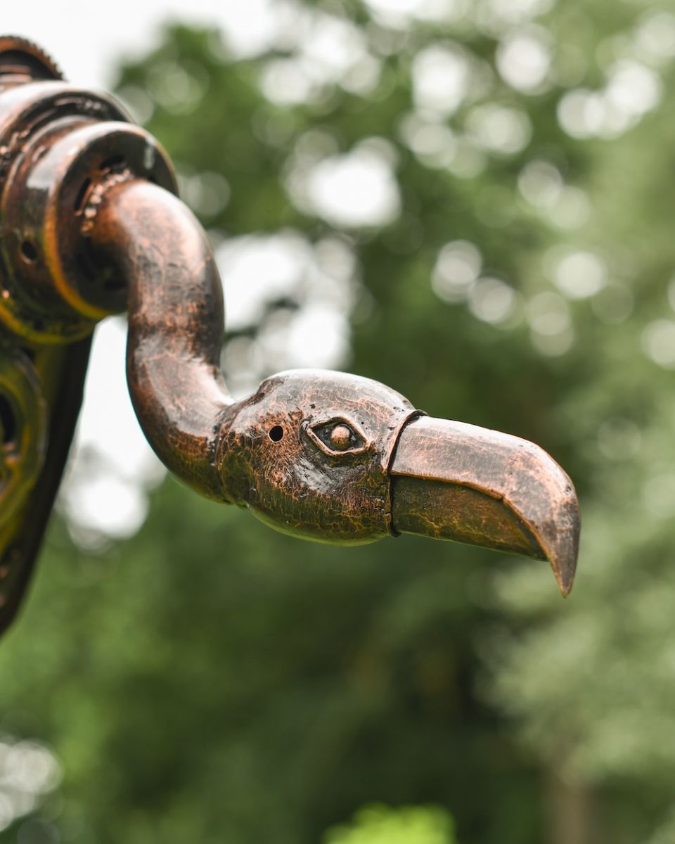 Close up of face detail on recycled metal art sculpture Close up of face detail on recycled metal art sculpture