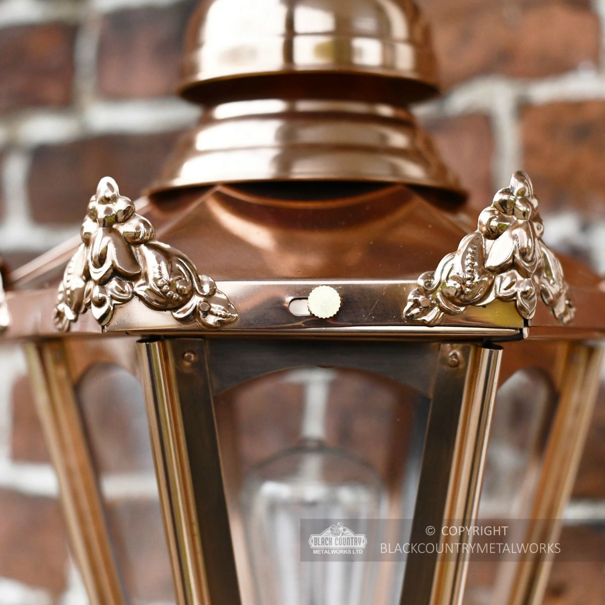 Detailed image of copper finish lantern