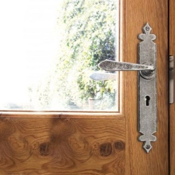 Tudor Design Sprung Lever Lock Set Fitted To A Wooden Door