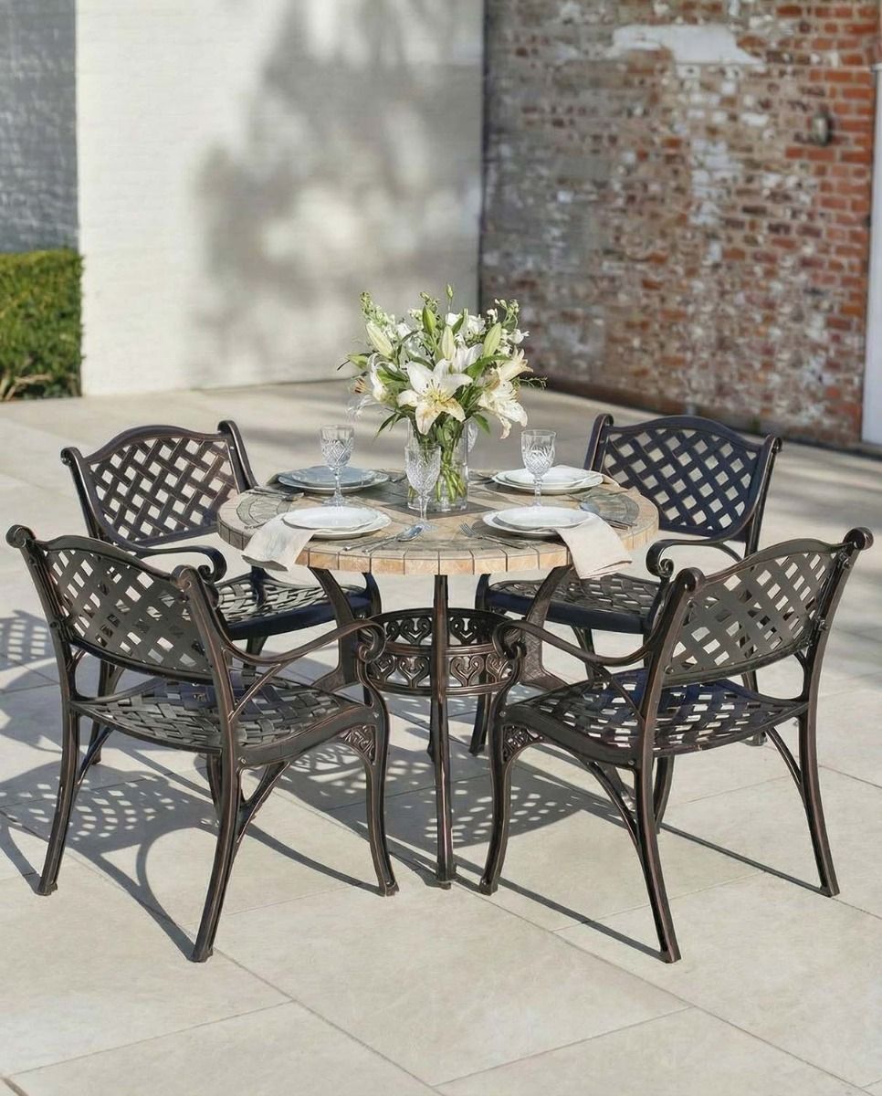 Digital Illustration of the "Abberton" Antique Copper Four Seater Outdoor Dining Set Dressed For Dining