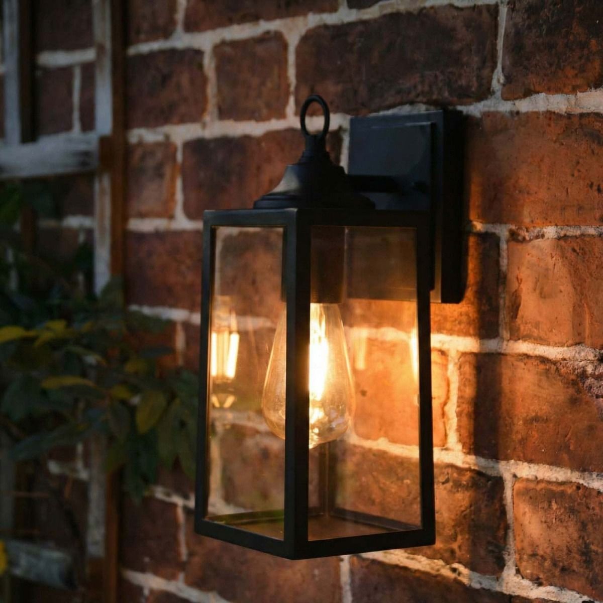 Digital Illustration of the Black Contemporary "Clearscape" Outdoor Rectangular Top Fix Wall Lantern Illuminated at Night.