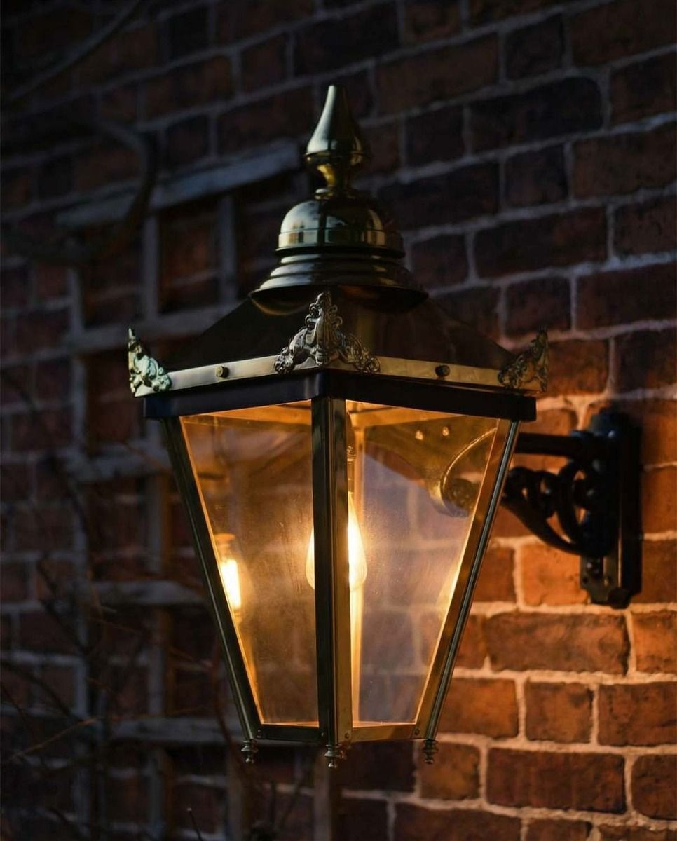 Digital Illustration of the Brass "Sunningdale" Lantern On Ornate Wall Bracket Illuminated at Night