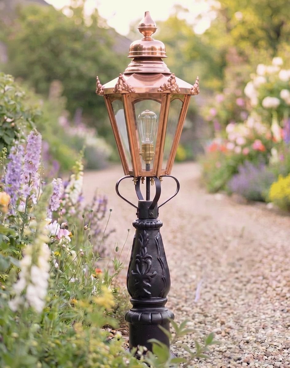 Digital Illustration 105cm Copper Concordia Patio or Driveway Lighting Positioned on a Flowery Gravel Driveway