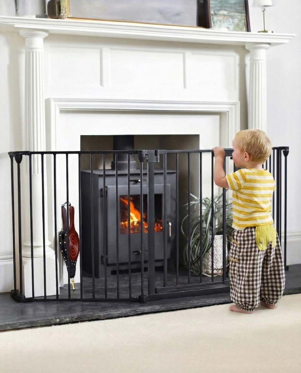 Digital illustration of "BabyPro" Midnight Black Three Panel Baby Safe Fire Guard with toddler stood in front of fireguard