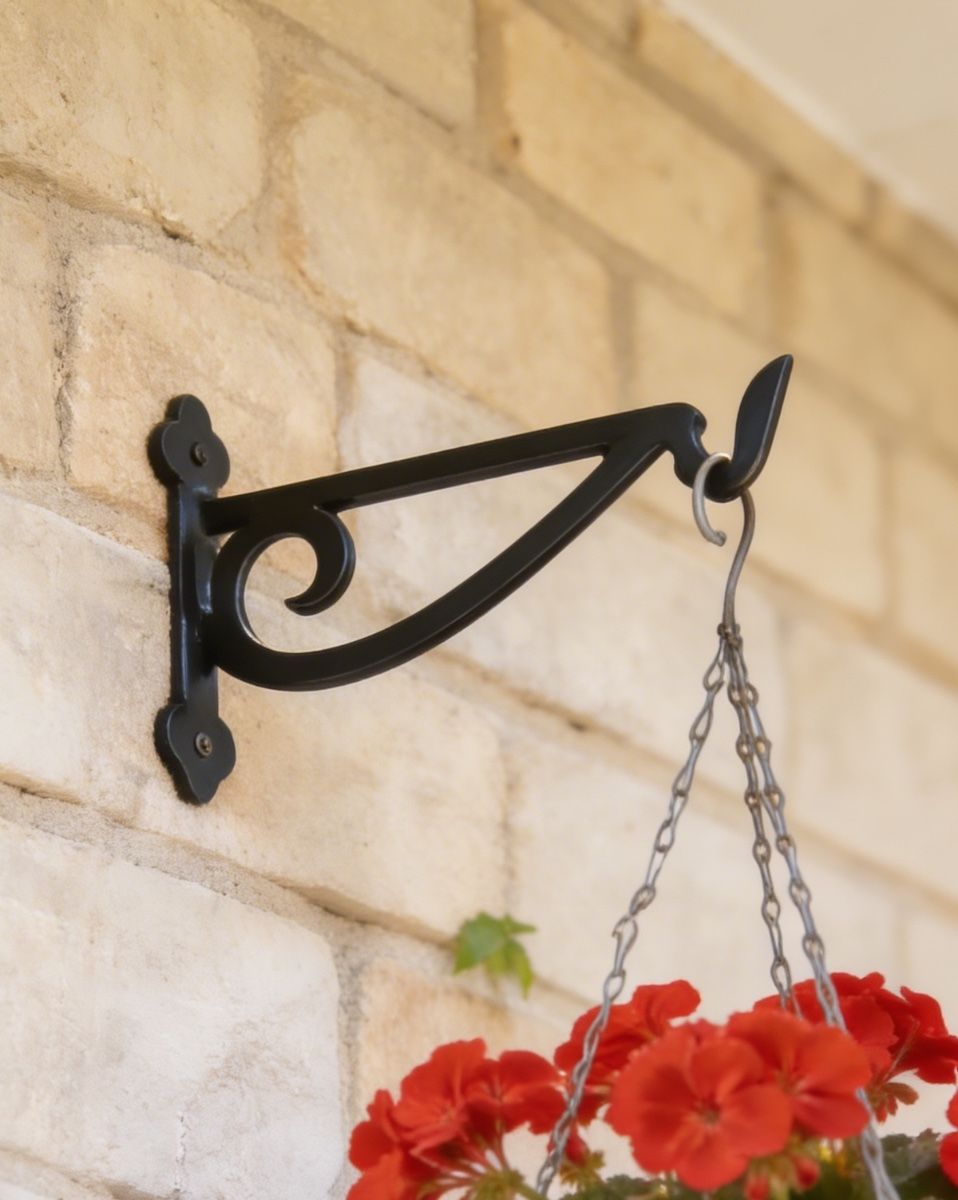 Digital illustration of Black Scroll Iron Hanging Basket Bracket on a brick wall close up image