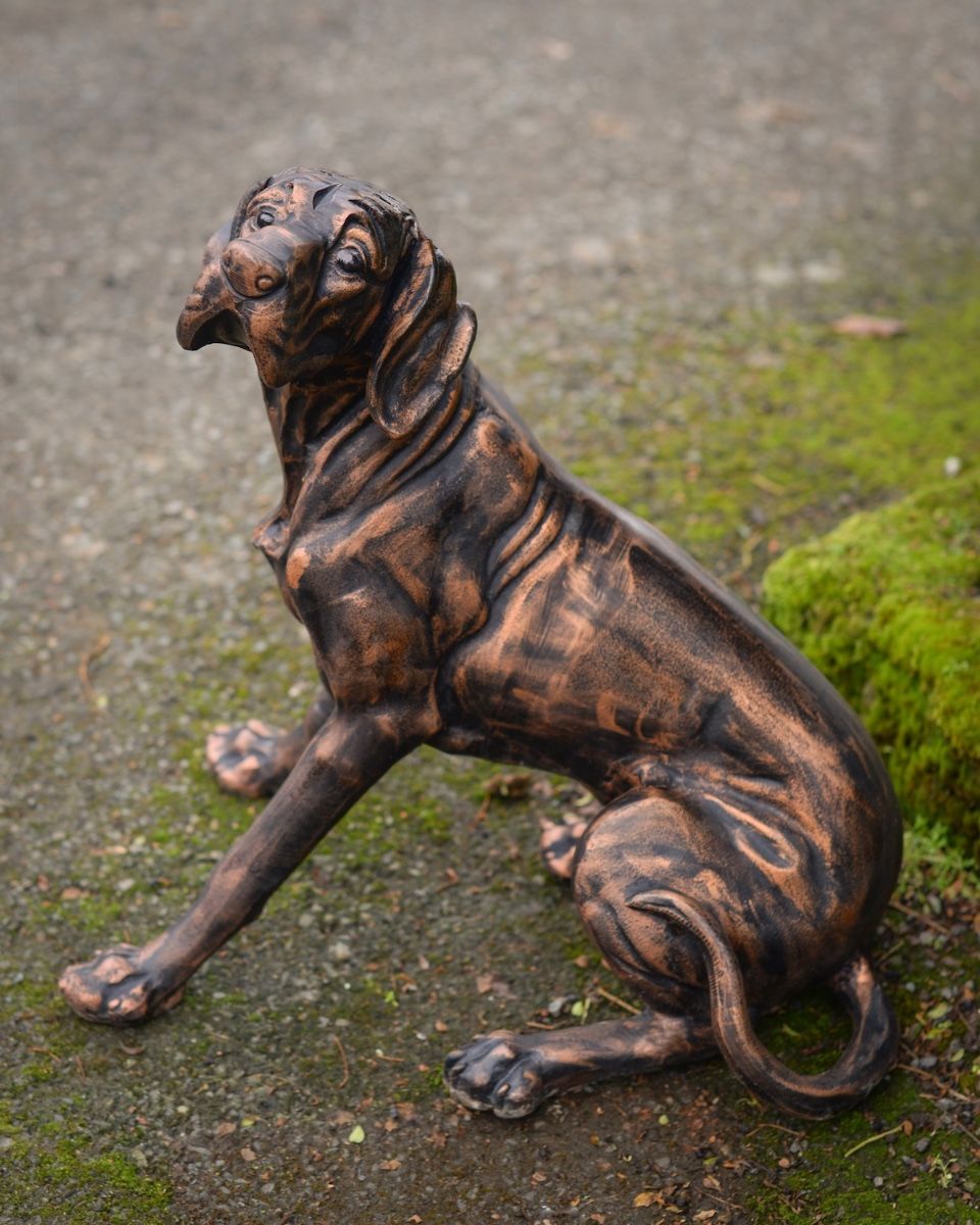 Digital Illustration of a Copper Version of "Duke" the Sitting Dog Sculpture in Cast Aluminium on a Garden Patio Looking at the Side