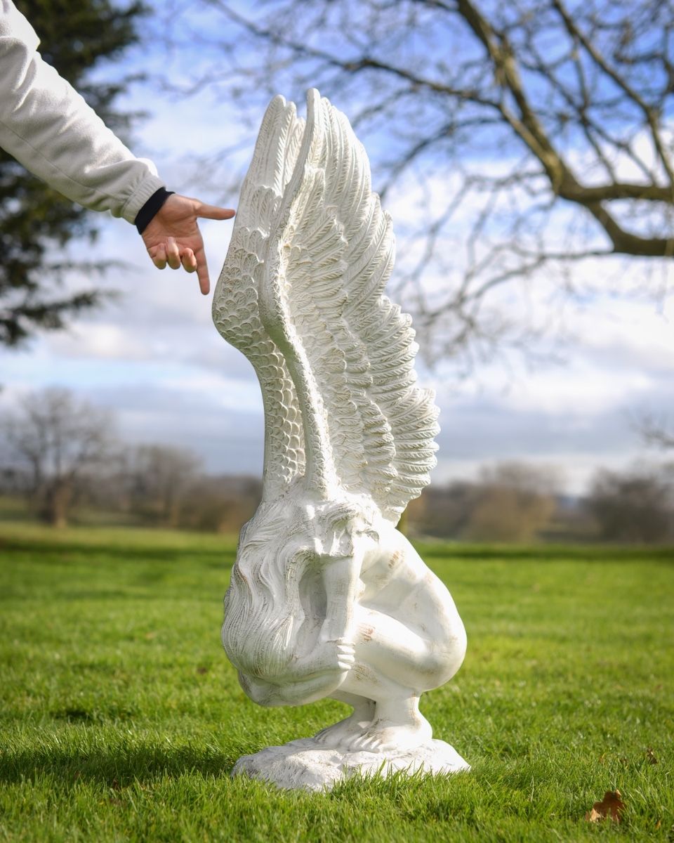 Digital illustration of ‘Solitude’ Angel Garden Sculpture in Cast Aluminium with hand in shot for scale