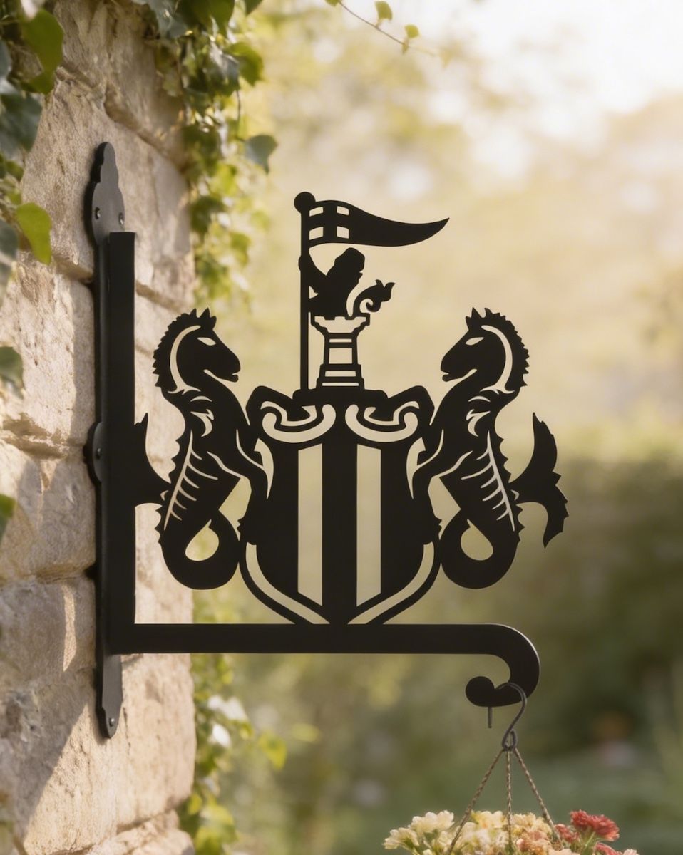 Digital illustration of Steel Newcastle United Crest Hanging Basket Bracket mounted on a garage