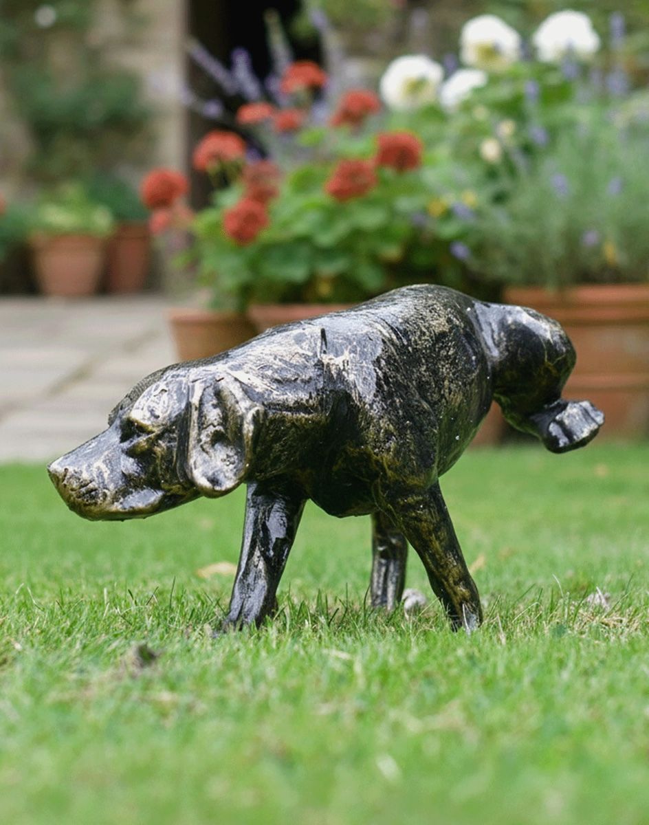 Digital Illustration of "Taking a Leak" Dog Sculpture on a Garden Lawn with Flowery Plant Pots