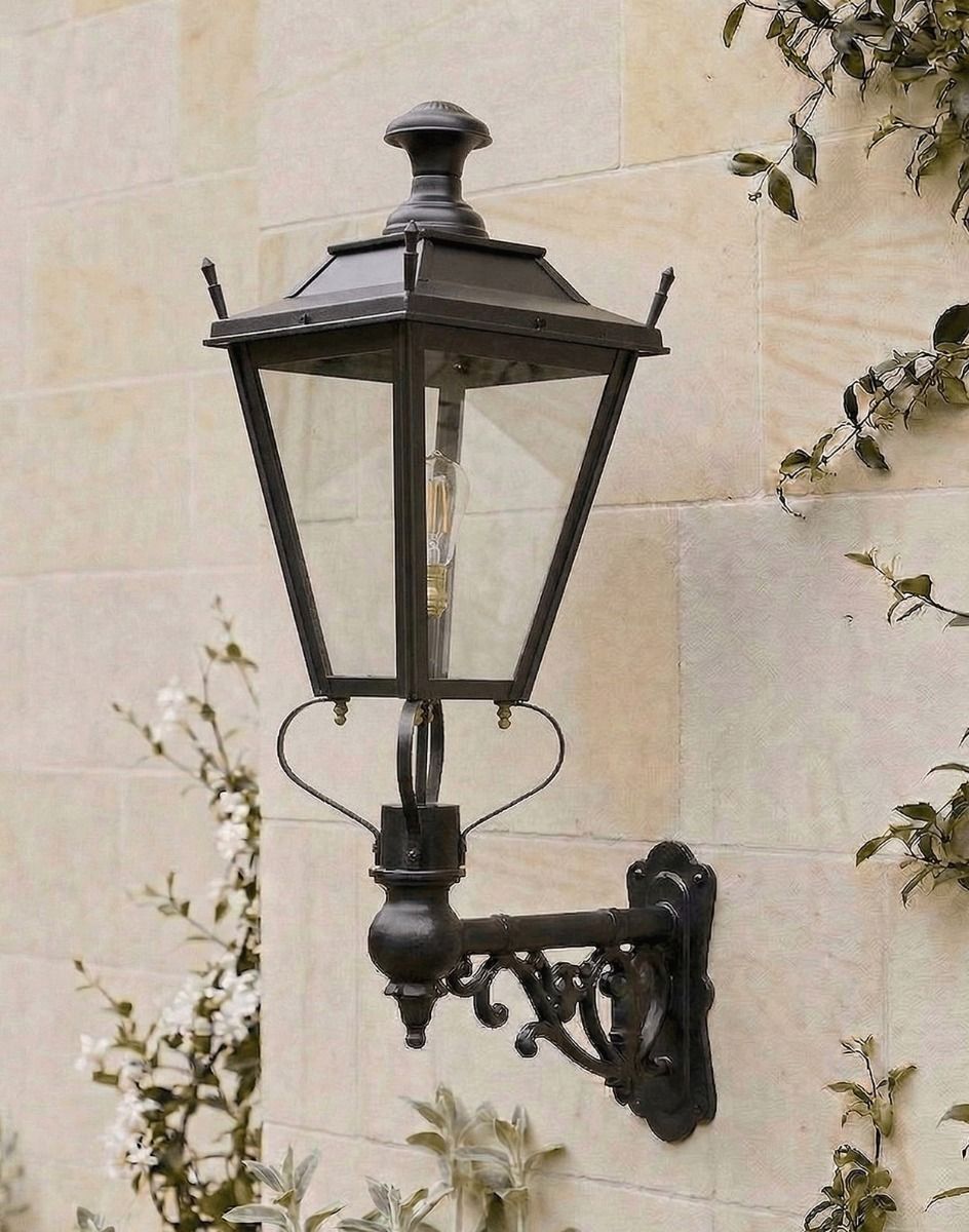 Digital Illustration of the 102 x 54cm Black Dorchester Wall Lantern on an Ornate Bracket Mounted on a Sandstone Brick Wall