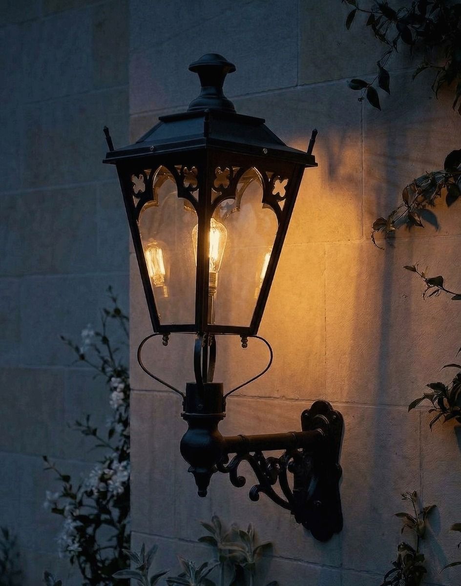 Digital Illustration of the 102 x 54cm Black Gothic Wall Lantern on an Ornate Bracket Lit up at Night 