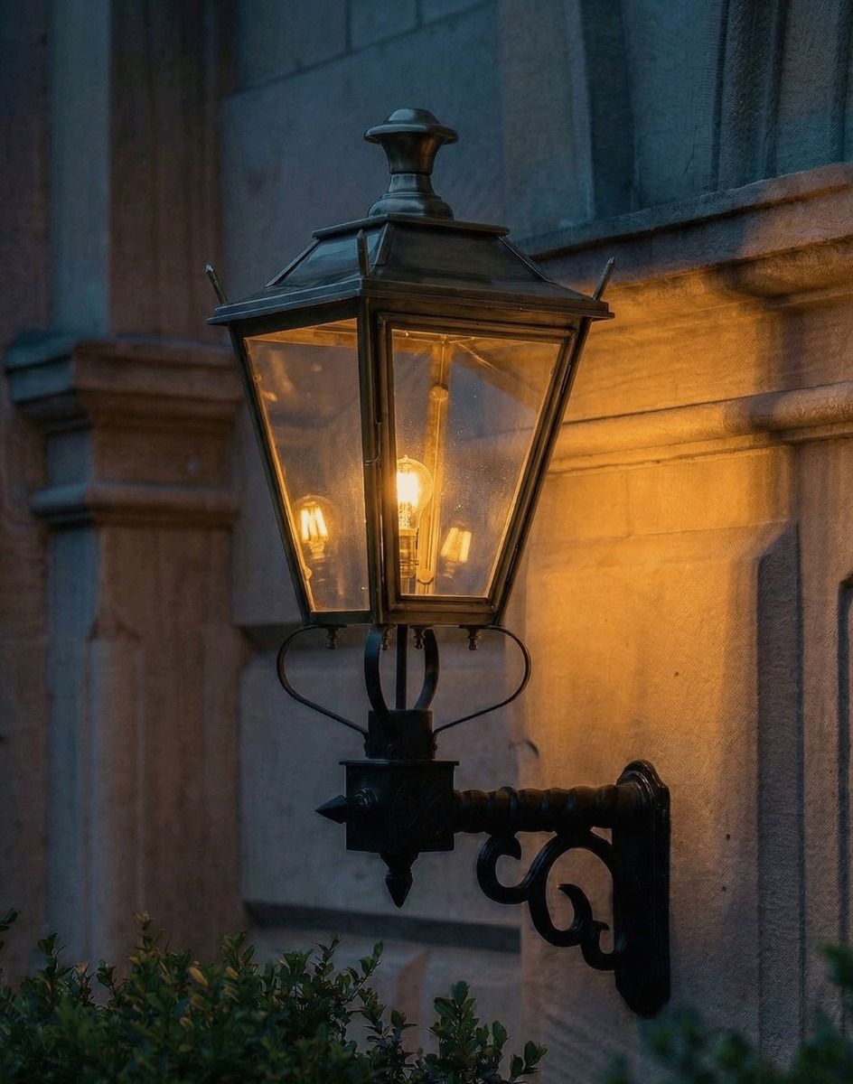 Digital Illustration of the 102 x 54cm Brass Dorchester Wall Lantern on a Royale Bracket Lit up at Night