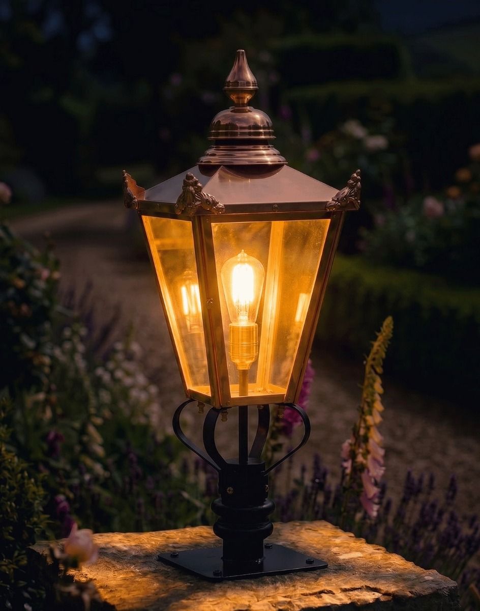 Digital Illustration of the 102cm Copper Victorian Pillar Light and Lantern Set Mounted on a Stone Garden Wall Pillar Whilst Lit up at Night